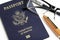 American Passport With Reading Glasses And Orange Fountain Pen