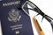 American Passport With Reading Glasses And Orange Fountain Pen
