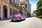American pink 1953 convertible vintage car on the street Jose Marti in the old town from Havana