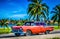 American red brown vintage car parked on the beach in Varadero Cuba - Serie Cuba Reportage