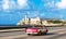 American red convertible 1954 vintage car drive on the famous promenade el Malecon and in the