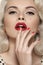 American retro. Fashion pin-up model, lips make-up, red nails
