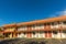 American road motel with blue sky on background.