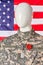 American soldier mannequin with red poppy.