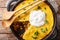 American Tamale corn pie crust and beef filling close-up in a pan. horizontal top view