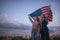 American teens with flag travel