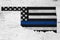 American thin blue line flag on map of Oklahoma