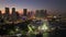 American urban landscape at night. Skyviews Miami Observation Wheel at Bayside Marketplace with reflections in