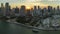 American urban landscape at sunset. Skyviews Miami Observation Wheel at Bayside Marketplace with reflections in