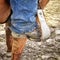 American West Rodeo Cowboy Dirty Boot on Stirrup