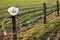 American West Rodeo Cowboy Hat and Lasso on Fence