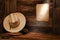 American West Rodeo Cowboy Hat and Rope in Barn