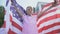 American young boy waving USA flag, celebrating independence day, 4th of July