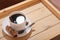 americano espresso coffee in classic white cup. coffee with cinnamon and anice on wooden tray. high angle view. spicy