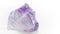 Amethyst macro photography. Purple translucent stone on a white background. Massage of the face and body with gems. The use of
