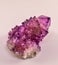 Amethyst stone isolated. Different amethyst crystal formation with one big point. Amethyst is one of the most using stones.