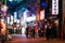 Ameyoko food street night life in Ueno district with tourists and Japanese people - Tokyo