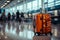 Amid the airport\\\'s commotion, a luggage bag blends into the blurred setting