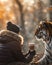 Amidst the morning light, a tiger and its owner share a peaceful coffee moment