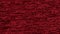 Amination red and black textured knit fabric background