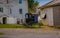 Amish buggy parked outside the barn