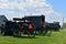 Amish Carts and Buggies Parked at a Farm