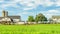 Amish country farm barn field agriculture and grazing cows in Lancaster, PA