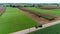 Amish Farmers Harvesting there Fall Crops as Seen by Drone