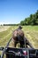 Amish hack in a hay field