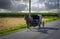 An Amish Horse and Buggy Traveling on a Country Road after Crossing a Railroad Crossing