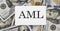 AML abbreviation stands for Anti Money laundering, on 100 dollars banknotes. No corruption concept