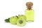 Amla fruit or indian gooseberry with green leaf and glass bottle of essential oil extract