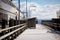 Ammersee lake, wooden jetty and touristic boats