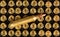 Ammunition cartridge on background. Golden bullet close up.