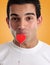 Amorous man kissing love heart on a stick