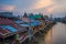 Amphawa district,Samut Songkhram Province,Thailand on April 12,2019:Amphawa Floating Market with beautiful sunset sky