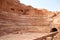 Amphitheatre of the lost ancient city of Petra with seats carved into the rocks, the Rose red City, Jordan