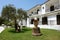 Amphora in the garden in front of the villa terraces.