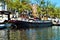 Amsterdam, Amstel river, boats, Netherlands, Europe and colorful buildings