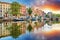 Amsterdam Canal houses at sunset reflections, Netherlands, panorama