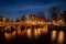 Amsterdam canal at twilight in winter, Netherlands