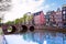 Amsterdam canal view with river and houses