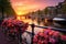 Amsterdam canals with bicycles and flowers at sunset. Holland, Beautiful sunrise over Amsterdam, The Netherlands, with flowers and
