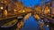 Amsterdam canals with Christmas lights during December, canal historical center Amsterdam at night