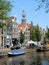Amsterdam center - Oudezijds Voorburgwal - canal houses with tower Oude Kerk