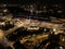 Amsterdam city center skyline by night aerial drone overhead view. Amsterdam Centraal, Ij, Oosterdok, Prins Hendrikkade