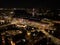 Amsterdam city center skyline by night aerial drone overhead view. Amsterdam Centraal, Ij, Oosterdok, Prins Hendrikkade