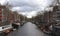 Amsterdam cityscape with houseboats in April, 2016