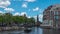 Amsterdam cityscape with view of canal and church time lapse