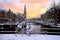 Amsterdam covered with snow with the Westerkerk in the Netherlands